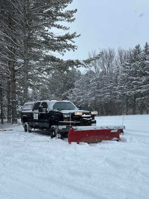 An image of our plow truck on a snowy day