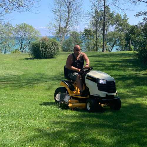 Aaron on a mower